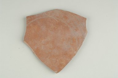 Coptic. <em>Stamped Dish Fragment</em>, 6th century C.E. Clay, 5 11/16 x 1/4 x 5 15/16 in. (14.5 x 0.7 x 15.1 cm). Brooklyn Museum, Gift of Evangeline Wilbour Blashfield, Theodora Wilbour, and Victor Wilbour honoring the wishes of their mother, Charlotte Beebe Wilbour, as a memorial to their father, Charles Edwin Wilbour, 16.154.1. Creative Commons-BY (Photo: Brooklyn Museum (in collaboration with Index of Christian Art, Princeton University), CUR.16.154.1_ICA.jpg)