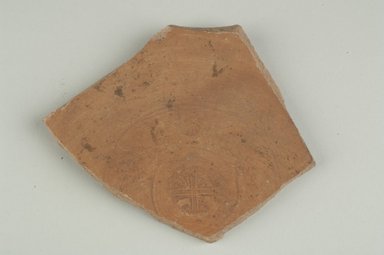 Coptic. <em>Stamped Bowl Fragment</em>, 6th century C.E. Clay, 3 5/8 x 3/8 x 4 in. (9.2 x 1 x 10.1 cm). Brooklyn Museum, Gift of Evangeline Wilbour Blashfield, Theodora Wilbour, and Victor Wilbour honoring the wishes of their mother, Charlotte Beebe Wilbour, as a memorial to their father, Charles Edwin Wilbour, 16.154.2. Creative Commons-BY (Photo: Brooklyn Museum (in collaboration with Index of Christian Art, Princeton University), CUR.16.154.2_ICA.jpg)