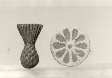  <em>Inlay</em>. Faience, 3/16 × Diam. 1 7/16 in. (0.4 × 3.6 cm). Brooklyn Museum, Gift of Evangeline Wilbour Blashfield, Theodora Wilbour, and Victor Wilbour honoring the wishes of their mother, Charlotte Beebe Wilbour, as a memorial to their father, Charles Edwin Wilbour, 16.194. Creative Commons-BY (Photo: , CUR.16.194_L1006_0_bw.jpg)