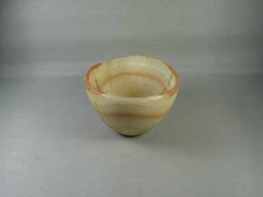  <em>Flat-botted Bowl</em>. Egyptian alabaster (calcite), 4 3/16 × Diam. 6 3/16 in. (10.6 × 15.7 cm). Brooklyn Museum, Gift of Evangeline Wilbour Blashfield, Theodora Wilbour, and Victor Wilbour honoring the wishes of their mother, Charlotte Beebe Wilbour, as a memorial to their father, Charles Edwin Wilbour, 16.196. Creative Commons-BY (Photo: , CUR.16.196_view01.jpg)