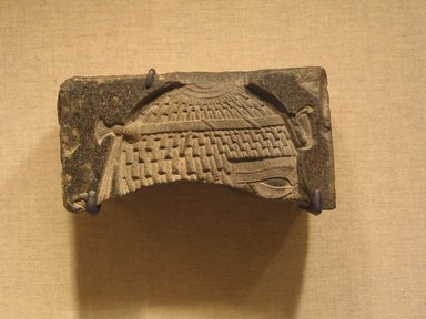  <em>Fragmentary Relief of a King</em>, ca. 664–525 B.C.E. Basalt, 2 11/16 × 5 1/2 × 2 in. (6.8 × 13.9 × 5.1 cm). Brooklyn Museum, Gift of Evangeline Wilbour Blashfield, Theodora Wilbour, and Victor Wilbour honoring the wishes of their mother, Charlotte Beebe Wilbour, as a memorial to their father, Charles Edwin Wilbour, 16.237. Creative Commons-BY (Photo: Brooklyn Museum, CUR.16.237_wwg8.jpg)