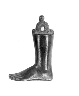 Possibly Egypto-Roman. <em>Weight in the Form of a Human Foot and Leg</em>, 27 B.C.E. – 284 C.E. Bronze, 2 1/2 x 1 11/16 in., 0.3 lb. (6.4 x 4.3 cm, 121.35 g). Brooklyn Museum, Gift of Evangeline Wilbour Blashfield, Theodora Wilbour, and Victor Wilbour honoring the wishes of their mother, Charlotte Beebe Wilbour, as a memorial to their father, Charles Edwin Wilbour, 16.246. Creative Commons-BY (Photo: Brooklyn Museum, CUR.16.246_print_negL_977_37_bw.jpg)