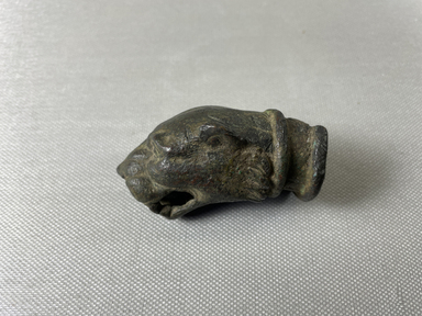  <em>Panther Head</em>, 30 B.C.E.-100 C.E. Bronze, 1 1/8 × 1 3/4 × 5 3/8 in. (2.9 × 4.4 × 13.7 cm). Brooklyn Museum, Gift of Evangeline Wilbour Blashfield, Theodora Wilbour, and Victor Wilbour honoring the wishes of their mother, Charlotte Beebe Wilbour, as a memorial to their father, Charles Edwin Wilbour, 16.249. Creative Commons-BY (Photo: Brooklyn Museum, CUR.16.249_view01.jpg)