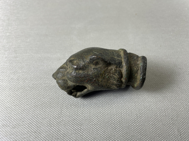  <em>Panther Head</em>, 30 B.C.E.–100 C.E. Bronze, 1 1/8 × 1 3/4 × 5 3/8 in. (2.9 × 4.4 × 13.7 cm). Brooklyn Museum, Gift of Evangeline Wilbour Blashfield, Theodora Wilbour, and Victor Wilbour honoring the wishes of their mother, Charlotte Beebe Wilbour, as a memorial to their father, Charles Edwin Wilbour, 16.249. Creative Commons-BY (Photo: Brooklyn Museum, CUR.16.249_view01.jpg)