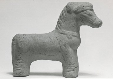  <em>Statuette of a Standing Horse</em>, 3rd-4th century C.E. Terracotta, 2 15/16 x 1 x 2 9/16 in. (7.4 x 2.5 x 6.5 cm). Brooklyn Museum, Gift of Evangeline Wilbour Blashfield, Theodora Wilbour, and Victor Wilbour honoring the wishes of their mother, Charlotte Beebe Wilbour, as a memorial to their father, Charles Edwin Wilbour, 16.274. Creative Commons-BY (Photo: Brooklyn Museum, CUR.16.274_NegB_print_bw.jpg)