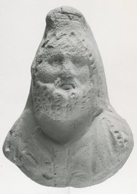  <em>Relief Bust of Serapis</em>, 3rd century C.E. Terracotta, 2 3/4 x 2 1/16 in. (7 x 5.2 cm). Brooklyn Museum, Gift of Evangeline Wilbour Blashfield, Theodora Wilbour, and Victor Wilbour honoring the wishes of their mother, Charlotte Beebe Wilbour, as a memorial to their father, Charles Edwin Wilbour, 16.285. Creative Commons-BY (Photo: Brooklyn Museum, CUR.16.285_NegA_print_bw.jpg)