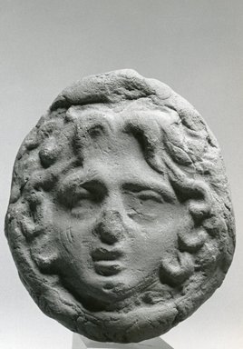  <em>Disk</em>. Terracotta, pigment, 3 1/8 x 2 11/16 in. (8 x 6.9 cm). Brooklyn Museum, Gift of Evangeline Wilbour Blashfield, Theodora Wilbour, and Victor Wilbour honoring the wishes of their mother, Charlotte Beebe Wilbour, as a memorial to their father, Charles Edwin Wilbour, 16.287. Creative Commons-BY (Photo: Brooklyn Museum, CUR.16.287_NegA_print_bw.jpg)