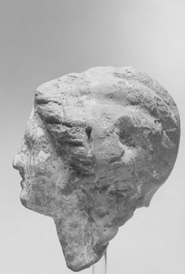  <em>Female Head</em>, ca. 170 B.C.E.-100 C.E. Clay, pigment, 3 1/4 x 2 5/16 x 3 in. (8.3 x 5.9 x 7.6 cm). Brooklyn Museum, Gift of Evangeline Wilbour Blashfield, Theodora Wilbour, and Victor Wilbour honoring the wishes of their mother, Charlotte Beebe Wilbour, as a memorial to their father, Charles Edwin Wilbour, 16.288. Creative Commons-BY (Photo: Brooklyn Museum, CUR.16.288_NegD_print_bw.jpg)
