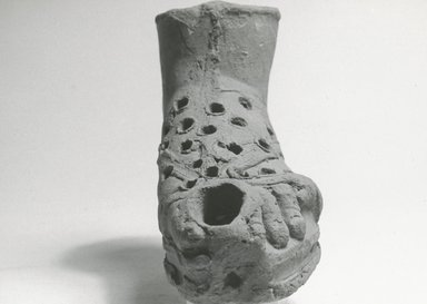  <em>Lamp</em>, 2nd-3rd century C.E. Terracotta, 3 1/4 x 1 7/8 x 4 9/16 in. (8.2 x 4.8 x 11.6 cm). Brooklyn Museum, Gift of Evangeline Wilbour Blashfield, Theodora Wilbour, and Victor Wilbour honoring the wishes of their mother, Charlotte Beebe Wilbour, as a memorial to their father, Charles Edwin Wilbour, 16.309. Creative Commons-BY (Photo: Brooklyn Museum, CUR.16.309_NegA_print_bw.jpg)