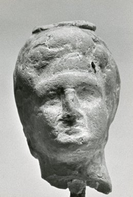 Greek. <em>Small Female Head</em>, 170 B.C.E.–100 C.E. Clay, pigment, 1 9/16 x 15/16 x 1 1/8 in. (3.9 x 2.5 x 2.8 cm). Brooklyn Museum, Gift of Evangeline Wilbour Blashfield, Theodora Wilbour, and Victor Wilbour honoring the wishes of their mother, Charlotte Beebe Wilbour, as a memorial to their father, Charles Edwin Wilbour, 16.316. Creative Commons-BY (Photo: Brooklyn Museum, CUR.16.316_NegA_print_bw.jpg)