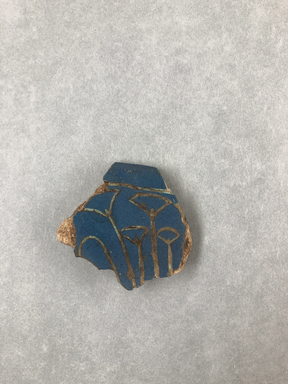  <em>Bowl Fragment</em>, ca. 1352–1332 B.C.E. Faience, 1 3/4 × 3/8 × 1 15/16 in. (4.5 × 1 × 5 cm). Brooklyn Museum, Gift of Evangeline Wilbour Blashfield, Theodora Wilbour, and Victor Wilbour honoring the wishes of their mother, Charlotte Beebe Wilbour, as a memorial to their father, Charles Edwin Wilbour, 16.341. Creative Commons-BY (Photo: , CUR.16.341_view01.jpg)