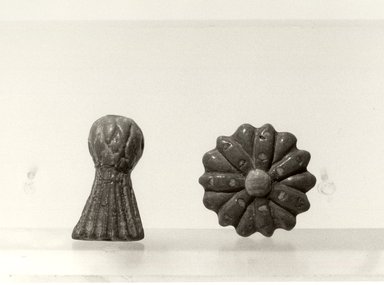  <em>Corn Flower</em>. Faience, 11/16 x 1 1/4 in. (1.7 x 3.1 cm). Brooklyn Museum, Charles Edwin Wilbour Fund, 33.684a. Creative Commons-BY (Photo: , CUR.16.345_33.684_L1006_2_grpA_bw.jpg)