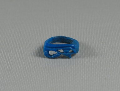 <em>Finger Ring</em>, ca. 1352–1332 B.C.E. Faience, 3/8 x 13/16 x 13/16 in. (0.9 x 2.1 x 2.1 cm). Brooklyn Museum, Gift of Evangeline Wilbour Blashfield, Theodora Wilbour, and Victor Wilbour honoring the wishes of their mother, Charlotte Beebe Wilbour, as a memorial to their father, Charles Edwin Wilbour, 16.356. Creative Commons-BY (Photo: Brooklyn Museum, CUR.16.356_view2.jpg)