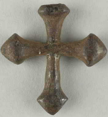 Coptic. <em>Cross</em>, 5th-7th century C.E. Iron, 13/16 × 13/16 in. (2.1 × 2 cm). Brooklyn Museum, Gift of Evangeline Wilbour Blashfield, Theodora Wilbour, and Victor Wilbour honoring the wishes of their mother, Charlotte Beebe Wilbour, as a memorial to their father, Charles Edwin Wilbour, 16.370. Creative Commons-BY (Photo: Brooklyn Museum (in collaboration with Index of Christian Art, Princeton University), CUR.16.370_ICA.jpg)