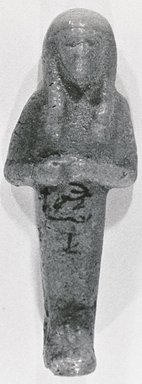  <em>Ushabti</em>, ca. 1539-1075 B.C.E. Faience, 4 1/2 x 1 13/16 in. (11.5 x 4.6 cm). Brooklyn Museum, Gift of Evangeline Wilbour Blashfield, Theodora Wilbour, and Victor Wilbour honoring the wishes of their mother, Charlotte Beebe Wilbour, as a memorial to their father, Charles Edwin Wilbour, 16.372. Creative Commons-BY (Photo: Brooklyn Museum, CUR.16.372_NegA_print_bw.jpg)
