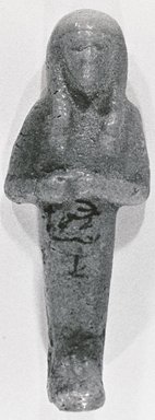  <em>Ushabti</em>, ca. 1539–1075 B.C.E. Faience, 4 1/2 x 1 13/16 in. (11.5 x 4.6 cm). Brooklyn Museum, Gift of Evangeline Wilbour Blashfield, Theodora Wilbour, and Victor Wilbour honoring the wishes of their mother, Charlotte Beebe Wilbour, as a memorial to their father, Charles Edwin Wilbour, 16.372. Creative Commons-BY (Photo: Brooklyn Museum, CUR.16.372_NegA_print_bw.jpg)