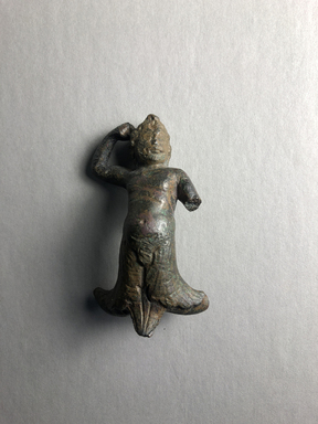 Egypto-Roman. <em>Figure of a Nymph</em>, 100-395 C.E. Bronze, 2 9/16 × 1 9/16 × 1 in. (6.5 × 3.9 × 2.6 cm). Brooklyn Museum, Gift of Evangeline Wilbour Blashfield, Theodora Wilbour, and Victor Wilbour honoring the wishes of their mother, Charlotte Beebe Wilbour, as a memorial to their father, Charles Edwin Wilbour, 16.392. Creative Commons-BY (Photo: , CUR.16.392_view01.jpg)