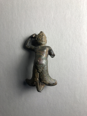 Egypto-Roman. <em>Figure of a Nymph</em>, 100–395 C.E. Bronze, 2 9/16 × 1 9/16 × 1 in. (6.5 × 3.9 × 2.6 cm). Brooklyn Museum, Gift of Evangeline Wilbour Blashfield, Theodora Wilbour, and Victor Wilbour honoring the wishes of their mother, Charlotte Beebe Wilbour, as a memorial to their father, Charles Edwin Wilbour, 16.392. Creative Commons-BY (Photo: , CUR.16.392_view01.jpg)