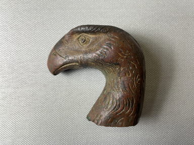 Egypto-Roman. <em>Head of a Bird</em>, ca. 2nd–3rd century C.E. Bronze, 2 9/16 × 1 1/4 × 2 13/16 in. (6.5 × 3.1 × 7.1 cm). Brooklyn Museum, Gift of Evangeline Wilbour Blashfield, Theodora Wilbour, and Victor Wilbour honoring the wishes of their mother, Charlotte Beebe Wilbour, as a memorial to their father, Charles Edwin Wilbour, 16.394. Creative Commons-BY (Photo: Brooklyn Museum, CUR.16.394_view01.jpg)