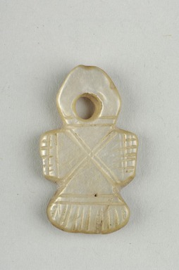 Coptic. <em>Cross Pendant</em>, 7th century C.E. Mother of pearl, 9/16 × 3/16 × 1 1/16 in. (1.5 × 0.4 × 2.7 cm). Brooklyn Museum, Gift of Evangeline Wilbour Blashfield, Theodora Wilbour, and Victor Wilbour honoring the wishes of their mother, Charlotte Beebe Wilbour, as a memorial to their father, Charles Edwin Wilbour, 16.402. Creative Commons-BY (Photo: Brooklyn Museum (in collaboration with Index of Christian Art, Princeton University), CUR.16.402_view1_ICA.jpg)