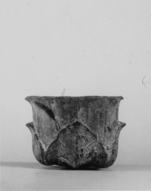 Graeco-Egyptian. <em>Vessel</em>, 30 B.C.E.–100 C.E. Metal, 1 5/8 × 2 5/16 in. (4.1 × 5.8 cm). Brooklyn Museum, Gift of Evangeline Wilbour Blashfield, Theodora Wilbour, and Victor Wilbour honoring the wishes of their mother, Charlotte Beebe Wilbour, as a memorial to their father, Charles Edwin Wilbour, 16.403. Creative Commons-BY (Photo: , CUR.16.403_noneg_print_bw.jpg)