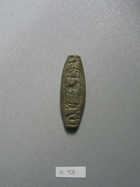 Egyptian. <em>Bead inscribed for King Shabaka</em>, ca. 716-702 B.C.E. Faience, 13/16 x 3/8 x 2 5/16 in. (2 x 1 x 5.8 cm). Brooklyn Museum, Gift of Evangeline Wilbour Blashfield, Theodora Wilbour, and Victor Wilbour honoring the wishes of their mother, Charlotte Beebe Wilbour, as a memorial to their father, Charles Edwin Wilbour, 16.431. Creative Commons-BY (Photo: Brooklyn Museum, CUR.16.431_view1.jpg)