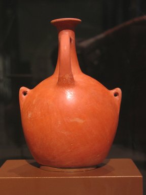  <em>Bottle Imitating Leather Water Container</em>, ca. 1479-1400 B.C.E. Clay, 6 1/4 x 4 1/2 x 3 1/4 in. (15.8 x 11.5 x 8.2 cm). Brooklyn Museum, Gift of Evangeline Wilbour Blashfield, Theodora Wilbour, and Victor Wilbour honoring the wishes of their mother, Charlotte Beebe Wilbour, as a memorial to their father Charles Edwin Wilbour, 16.580.128. Creative Commons-BY (Photo: Brooklyn Museum, CUR.16.580.128_erg456.jpg)