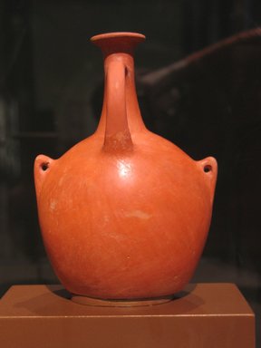  <em>Bottle Imitating Leather Water Container</em>, ca. 1479–1400 B.C.E. Clay, 6 1/4 x 4 1/2 x 3 1/4 in. (15.8 x 11.5 x 8.2 cm). Brooklyn Museum, Gift of Evangeline Wilbour Blashfield, Theodora Wilbour, and Victor Wilbour honoring the wishes of their mother, Charlotte Beebe Wilbour, as a memorial to their father Charles Edwin Wilbour, 16.580.128. Creative Commons-BY (Photo: Brooklyn Museum, CUR.16.580.128_erg456.jpg)