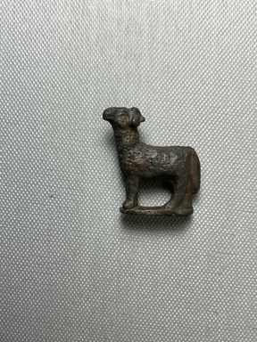  <em>Miniature Figure of a Ram</em>, 305 B.C.E.-395 C.E. Bronze, 1 7/16 × 1 5/16 × 1/2 in. (3.7 × 3.3 × 1.2 cm). Brooklyn Museum, Gift of Evangeline Wilbour Blashfield, Theodora Wilbour, and Victor Wilbour honoring the wishes of their mother, Charlotte Beebe Wilbour, as a memorial to their father, Charles Edwin Wilbour, 16.580.170. Creative Commons-BY (Photo: Brooklyn Museum, CUR.16.580.170_view01.jpg)