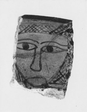  <em>Fragment with the Face of Hathor</em>, ca. 1630-1539 B.C.E. Faience, 2 1/4 × 1 3/4 × 5/8 in. (5.7 × 4.4 × 1.6 cm). Brooklyn Museum, Gift of Evangeline Wilbour Blashfield, Theodora Wilbour, and Victor Wilbour honoring the wishes of their mother, Charlotte Beebe Wilbour, as a memorial to their father, Charles Edwin Wilbour, 16.580.177. Creative Commons-BY (Photo: Brooklyn Museum, CUR.16.580.177_NegA_print_bw.jpg)