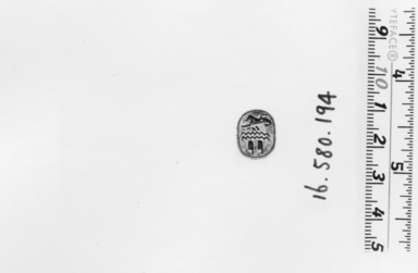  <em>Scarab</em>. Faience or glazed steatite, 1/4 x 7/16 x 9/16 in. (0.7 x 1.1 x 1.4 cm). Brooklyn Museum, Gift of Evangeline Wilbour Blashfield, Theodora Wilbour, and Victor Wilbour honoring the wishes of their mother, Charlotte Beebe Wilbour, as a memorial to their father, Charles Edwin Wilbour, 16.580.194. Creative Commons-BY (Photo: , CUR.16.580.194_NegA_print_bw.jpg)
