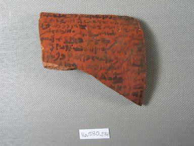  <em>Demotic Ostracon</em>, Year 11 (of Hadrian). Terracotta, pigment, 2 7/8 x 3/8 x 3 1/16 in. (7.3 x 0.9 x 7.7 cm). Brooklyn Museum, Gift of Evangeline Wilbour Blashfield, Theodora Wilbour, and Victor Wilbour honoring the wishes of their mother, Charlotte Beebe Wilbour, as a memorial to their father, Charles Edwin Wilbour, 16.580.234. Creative Commons-BY (Photo: Brooklyn Museum, CUR.16.580.234_view1.jpg)