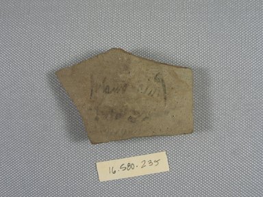  <em>Demotic Ostracon</em>. Terracotta, pigment, 1 13/16 x 5/16 x 2 11/16 in. (4.6 x 0.8 x 6.8 cm). Brooklyn Museum, Gift of Evangeline Wilbour Blashfield, Theodora Wilbour, and Victor Wilbour honoring the wishes of their mother, Charlotte Beebe Wilbour, as a memorial to their father, Charles Edwin Wilbour, 16.580.235. Creative Commons-BY (Photo: Brooklyn Museum, CUR.16.580.235_view1.jpg)