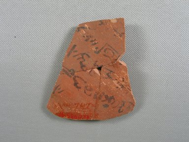  <em>Demotic Ostracon</em>. Terracotta, pigment, 2 11/16 x 3/16 x 3 3/4 in. (6.9 x 0.5 x 9.5 cm). Brooklyn Museum, Gift of Evangeline Wilbour Blashfield, Theodora Wilbour, and Victor Wilbour honoring the wishes of their mother, Charlotte Beebe Wilbour, as a memorial to their father, Charles Edwin Wilbour, 16.580.238. Creative Commons-BY (Photo: Brooklyn Museum, CUR.16.580.238_view1.jpg)