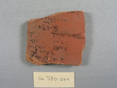  <em>Demotic Ostracon</em>. Terracotta, pigment, 2 3/16 x 1/4 x 2 3/8 in. (5.6 x 0.6 x 6 cm). Brooklyn Museum, Gift of Evangeline Wilbour Blashfield, Theodora Wilbour, and Victor Wilbour honoring the wishes of their mother, Charlotte Beebe Wilbour, as a memorial to their father, Charles Edwin Wilbour, 16.580.244. Creative Commons-BY (Photo: Brooklyn Museum, CUR.16.580.244_view1.jpg)