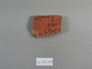  <em>Demotic Ostracon</em>. Terracotta, pigment, 1 3/8 x 1/4 x 2 1/16 in. (3.5 x 0.7 x 5.3 cm). Brooklyn Museum, Gift of Evangeline Wilbour Blashfield, Theodora Wilbour, and Victor Wilbour honoring the wishes of their mother, Charlotte Beebe Wilbour, as a memorial to their father, Charles Edwin Wilbour, 16.580.247. Creative Commons-BY (Photo: Brooklyn Museum, CUR.16.580.247_view1.jpg)