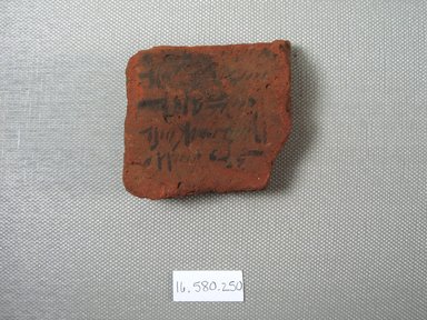  <em>Demotic Ostracon</em>. Terracotta, pigment, 2 1/16 x 9/16 x 2 7/16 in. (5.2 x 1.5 x 6.2 cm). Brooklyn Museum, Gift of Evangeline Wilbour Blashfield, Theodora Wilbour, and Victor Wilbour honoring the wishes of their mother, Charlotte Beebe Wilbour, as a memorial to their father, Charles Edwin Wilbour, 16.580.250. Creative Commons-BY (Photo: Brooklyn Museum, CUR.16.580.250_view1.jpg)