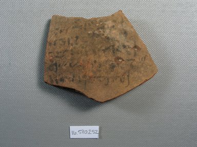  <em>Demotic Ostracon</em>. Terracotta, pigment, 2 7/8 x 3/8 x 3 1/2 in. (7.3 x 0.9 x 8.9 cm). Brooklyn Museum, Gift of Evangeline Wilbour Blashfield, Theodora Wilbour, and Victor Wilbour honoring the wishes of their mother, Charlotte Beebe Wilbour, as a memorial to their father, Charles Edwin Wilbour, 16.580.252. Creative Commons-BY (Photo: Brooklyn Museum, CUR.16.580.252_view1.jpg)