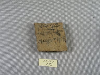 Demotic. <em>Demotic Ostracon</em>, Year 9 (of Ptolemy II Philadelphus?). Terracotta, pigment, 2 5/16 x 1/4 x 2 11/16 in. (5.9 x 0.7 x 6.9 cm). Brooklyn Museum, Gift of Evangeline Wilbour Blashfield, Theodora Wilbour, and Victor Wilbour honoring the wishes of their mother, Charlotte Beebe Wilbour, as a memorial to their father, Charles Edwin Wilbour, 16.580.508. Creative Commons-BY (Photo: Brooklyn Museum, CUR.16.580.508_view1.jpg)