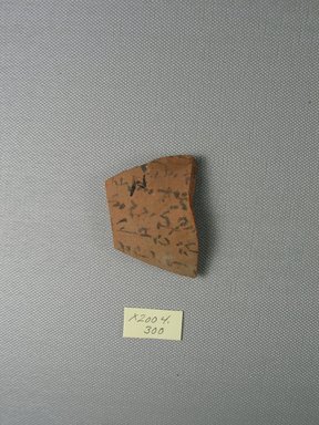 Demotic. <em>Demotic Ostracon</em>. Terracotta, pigment, 1 5/8 x 1/4 x 2 3/16 in. (4.2 x 0.7 x 5.5 cm). Brooklyn Museum, Gift of Evangeline Wilbour Blashfield, Theodora Wilbour, and Victor Wilbour honoring the wishes of their mother, Charlotte Beebe Wilbour, as a memorial to their father, Charles Edwin Wilbour, 16.580.518. Creative Commons-BY (Photo: Brooklyn Museum, CUR.16.580.518_view1.jpg)