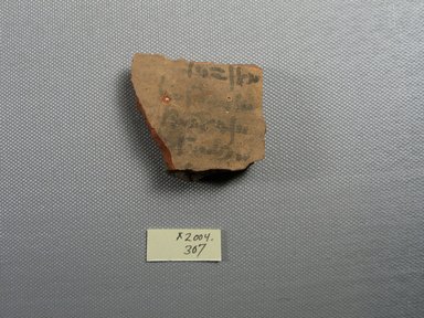 Demotic. <em>Demotic Ostracon</em>. Terracotta, pigment, 1 15/16 x 1 7/8 x 7/16 in. (4.9 x 4.7 x 1.1 cm). Brooklyn Museum, Gift of Evangeline Wilbour Blashfield, Theodora Wilbour, and Victor Wilbour honoring the wishes of their mother, Charlotte Beebe Wilbour, as a memorial to their father, Charles Edwin Wilbour, 16.580.524. Creative Commons-BY (Photo: Brooklyn Museum, CUR.16.580.524_view1.jpg)