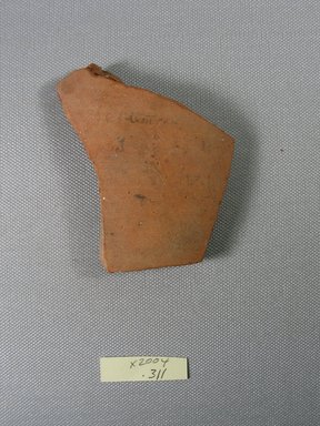 Demotic. <em>Demotic Ostracon</em>. Terracotta, pigment, 2 5/8 x 3/8 x 3 3/4 in. (6.7 x 0.9 x 9.5 cm). Brooklyn Museum, Gift of Evangeline Wilbour Blashfield, Theodora Wilbour, and Victor Wilbour honoring the wishes of their mother, Charlotte Beebe Wilbour, as a memorial to their father, Charles Edwin Wilbour, 16.580.528. Creative Commons-BY (Photo: Brooklyn Museum, CUR.16.580.528_view1.jpg)