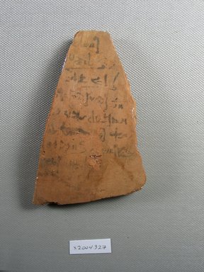 Demotic. <em>Demotic Ostracon</em>, Year 12 of a late (?) Ptolemy. Terracotta, pigment, 2 13/16 x 3/8 x 4 3/16 in. (7.2 x 1 x 10.7 cm). Brooklyn Museum, Gift of Evangeline Wilbour Blashfield, Theodora Wilbour, and Victor Wilbour honoring the wishes of their mother, Charlotte Beebe Wilbour, as a memorial to their father, Charles Edwin Wilbour, 16.580.544. Creative Commons-BY (Photo: Brooklyn Museum, CUR.16.580.544_view1.jpg)