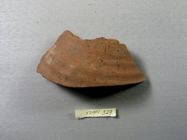 Demotic. <em>Demotic Ostracon</em>. Terracotta, pigment, 2 3/16 x 9/16 x 4 3/16 in. (5.6 x 1.4 x 10.7 cm). Brooklyn Museum, Gift of Evangeline Wilbour Blashfield, Theodora Wilbour, and Victor Wilbour honoring the wishes of their mother, Charlotte Beebe Wilbour, as a memorial to their father, Charles Edwin Wilbour, 16.580.546. Creative Commons-BY (Photo: Brooklyn Museum, CUR.16.580.546_view1.jpg)