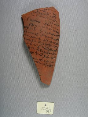 Demotic. <em>Demotic Ostracon</em>. Terracotta, pigment, 3 7/16 x 1/4 x 6 15/16 in. (8.8 x 0.7 x 17.6 cm). Brooklyn Museum, Gift of Evangeline Wilbour Blashfield, Theodora Wilbour, and Victor Wilbour honoring the wishes of their mother, Charlotte Beebe Wilbour, as a memorial to their father, Charles Edwin Wilbour, 16.580.555. Creative Commons-BY (Photo: Brooklyn Museum, CUR.16.580.555_view1.jpg)
