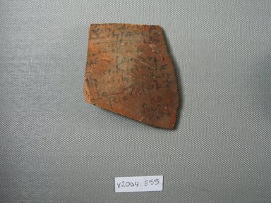 Demotic. <em>Demotic Ostracon</em>. Terracotta, pigment, 2 3/8 x 1/4 x 2 15/16 in. (6.1 x 0.6 x 7.5 cm). Brooklyn Museum, Gift of Evangeline Wilbour Blashfield, Theodora Wilbour, and Victor Wilbour honoring the wishes of their mother, Charlotte Beebe Wilbour, as a memorial to their father, Charles Edwin Wilbour, 16.580.566. Creative Commons-BY (Photo: Brooklyn Museum, CUR.16.580.566_view1.jpg)