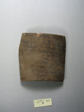 Demotic. <em>Demotic Ostracon</em>, Year 4 (?) of Nero. Terracotta, pigment, 3 7/8 x 1/4 x 3 7/8 in. (9.8 x 0.7 x 9.8 cm). Brooklyn Museum, Gift of Evangeline Wilbour Blashfield, Theodora Wilbour, and Victor Wilbour honoring the wishes of their mother, Charlotte Beebe Wilbour, as a memorial to their father, Charles Edwin Wilbour, 16.580.579. Creative Commons-BY (Photo: Brooklyn Museum, CUR.16.580.579_view1.jpg)