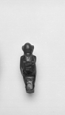  <em>Amulet in Form of Seated Monkey</em>, ca. 1539–1075 B.C.E., or earlier. Carnelian, Height: 1 1/16 in. (2.8 cm). Brooklyn Museum, Gift of Evangeline Wilbour Blashfield, Theodora Wilbour, and Victor Wilbour honoring the wishes of their mother, Charlotte Beebe Wilbour, as a memorial to their father, Charles Edwin Wilbour, 16.580.57. Creative Commons-BY (Photo: Brooklyn Museum, CUR.16.580.57_05.370_GRPC_cropped_bw.jpg)