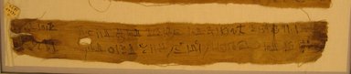  <em>Mummy Bandage</em>, 332 B.C.E.-1st century C.E. Linen, ink, 2 3/8 x 18 7/8 in. (6.0 x 48.0 cm). Brooklyn Museum, Gift of Evangeline Wilbour Blashfield, Theodora Wilbour, and Victor Wilbour honoring the wishes of their mother, Charlotte Beebe Wilbour, as a memorial to their father, Charles Edwin Wilbour, 16.580.607 (Photo: Brooklyn Museum, CUR.16.580.607_view1.jpg)