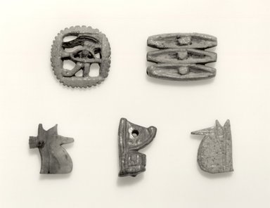  <em>Crown of Lower Egypt Amulet</em>, 305 B.C.E.-395 C.E. Faience, 1 x 11/16 in. (2.6 x 1.8 cm). Brooklyn Museum, Charles Edwin Wilbour Fund, 05.349. Creative Commons-BY (Photo: , CUR.16.580.62_16.580.63_16.580.3_05.349_16.580.10_negA_bw.jpg)